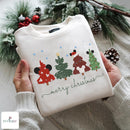 Off-white embroidered sweatshirt featuring four festive Mickey Mouse Christmas trees and merry christmas text